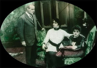 Detail from slide:  Lois Weber (center) in her last screen role.
