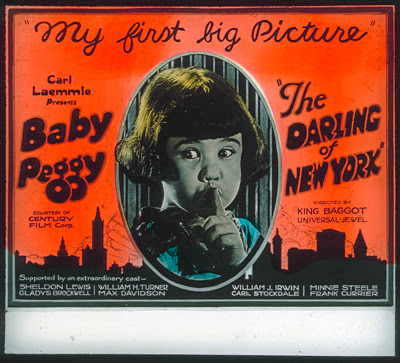 Advertising slide for Baby Peggy's first feature film, The Darling of New York (1923)